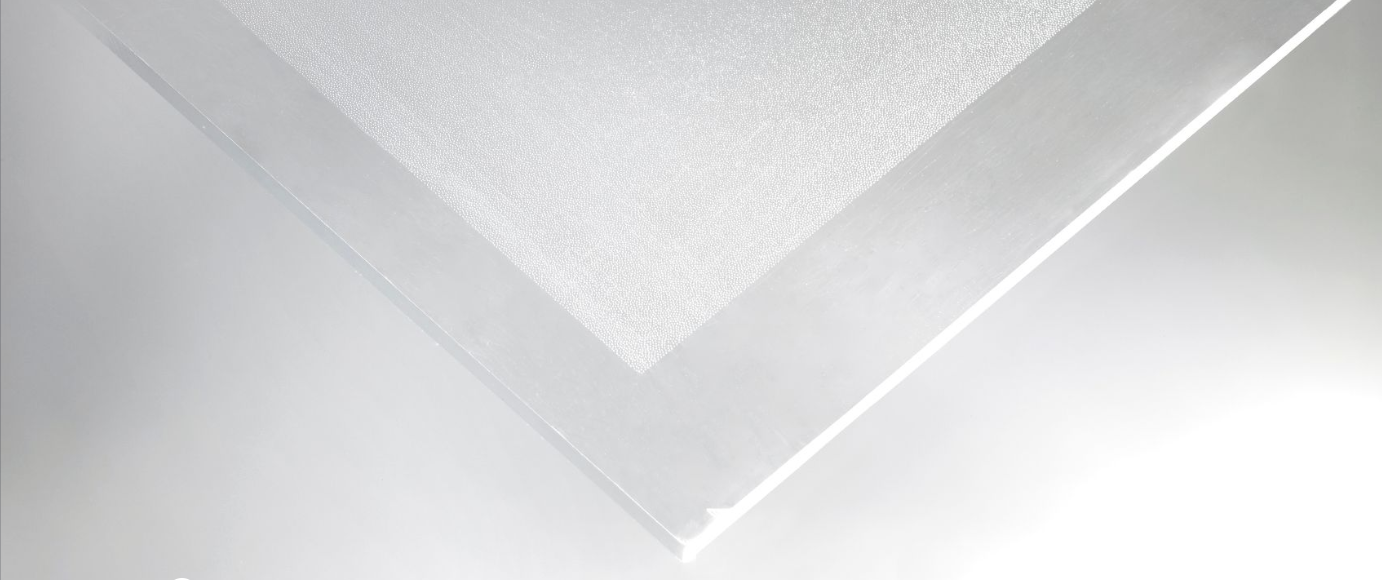 Optical pattern microstructures embossed onto a translucent light guide plate